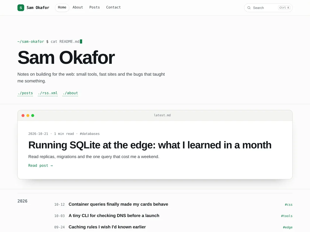 Sam Okafor, an example blog using the Developer theme, on a computer